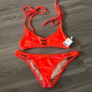 Out from under neon two piece swimsuit/bikini
